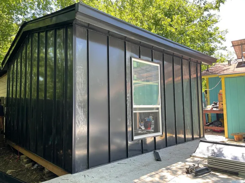 Black standing seam metal wall panels for Metal Roof Installation in North Oaks